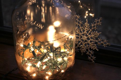 bottle christmas lights twinkle DIY - Christmas Lights in a Bottle tutorial featured by popular lifestyle blogger, Design Mom