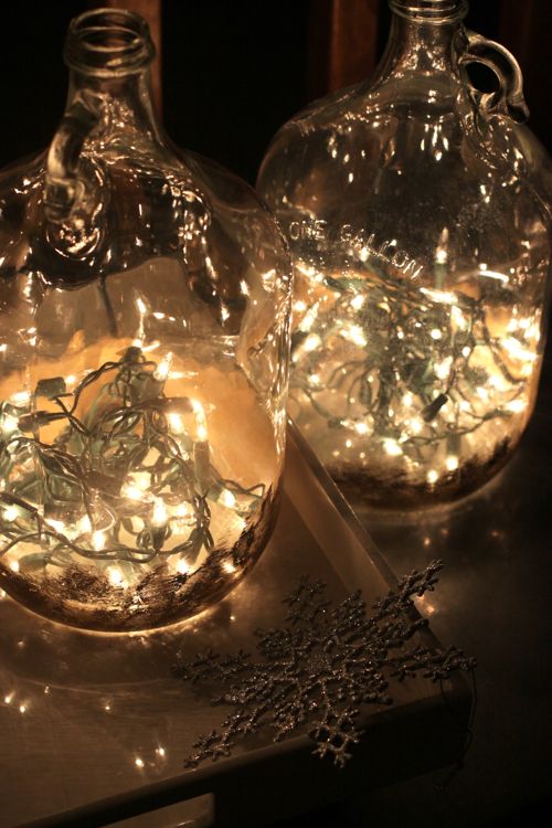 how to drill through glass - add a string of lights to a bottle - Christmas Lights in a Bottle tutorial featured by popular lifestyle blogger, Design Mom