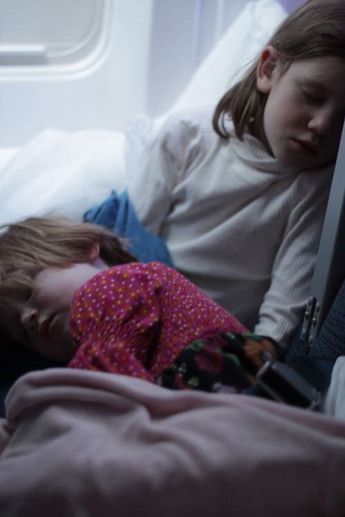 kids sleeping on airplane Olive Betty Blair