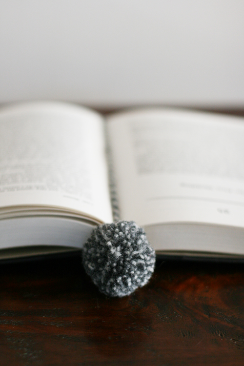 DIY yarn ball pom pom bookmark tutorial featured by top US lifestyle blogger, Design Mom