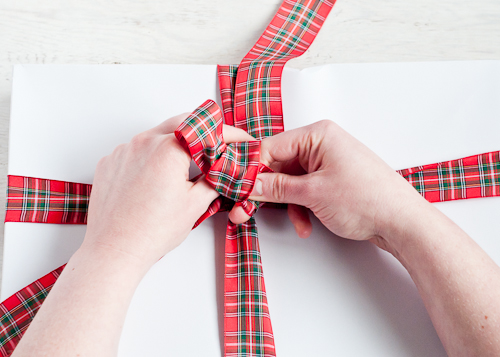How to tie a bow featured by popular lifestyle blogger, Gabrielle of Design Mom