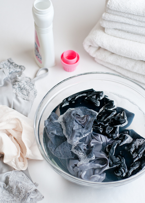 how to wash lingerie guide with underwear soaking in a glass bowl