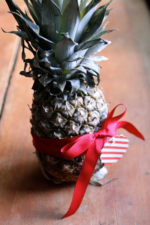 A whole pineapple as gift. (Click through for 9 last-minute hostess gifts - find them at any grocery store on your way to the party!)