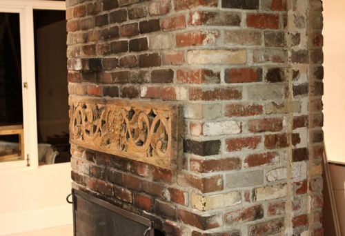 How to Whitewash Bricks - using natural paint that let's the bricks "breathe" | Design Mom - Whitewashed Bricks Tutorial featured on top lifestyle blog, Design Mom