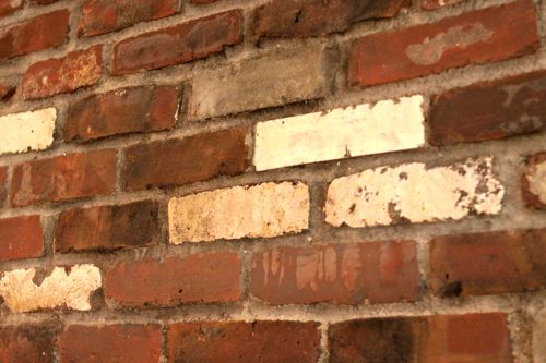 How to Whitewash Bricks - using natural paint that let's the bricks "breathe"  | Design Mom - Whitewashed Bricks Tutorial featured on top lifestyle blog, Design Mom
