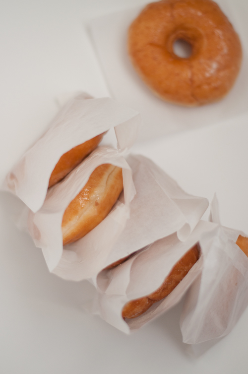 Donuts in open glassine bags.
