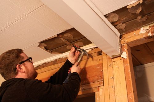 Can't get your acoustic tiles down? Stop useless scraping and use a heat gun instead.