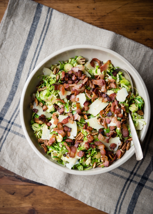 Warm Shaved Brussels Sprouts with Bacon Pecans and Parmesan, a perfect side dish for Thanksgiving | Design Mom