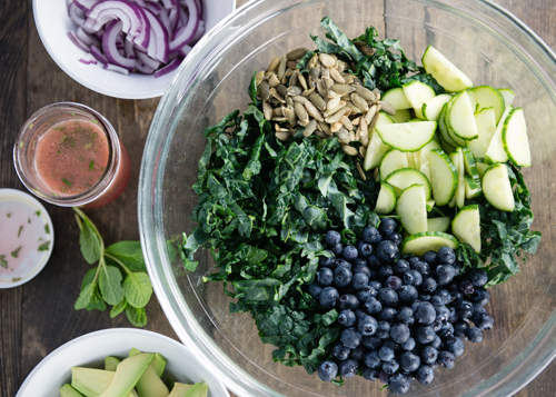 kale ribbons and ingredients for salad