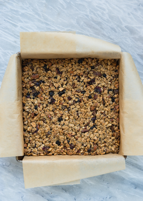 Homemade Berry Almond Granola Bars. Cooling and setting, waiting to be chopped into bars