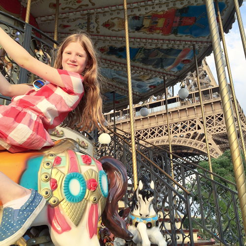 Itinerary for a perfect day in Paris with kids - carousel at the Eiffel Tower