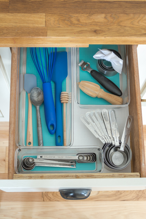 Tip 2: A place for everything, and everything in it's place. Find 5 other tips to help you organize your kitchen when you click through!