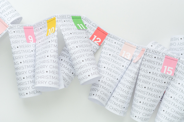 Easy DIY Advent Calendar - just print, trim, roll and sew. Free printable!