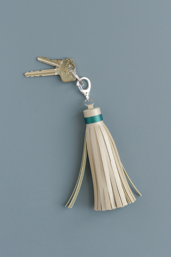 Easy DIY Leather Tassels - Use a Cricut Machine for the cutting! Add them to handbags or keys.