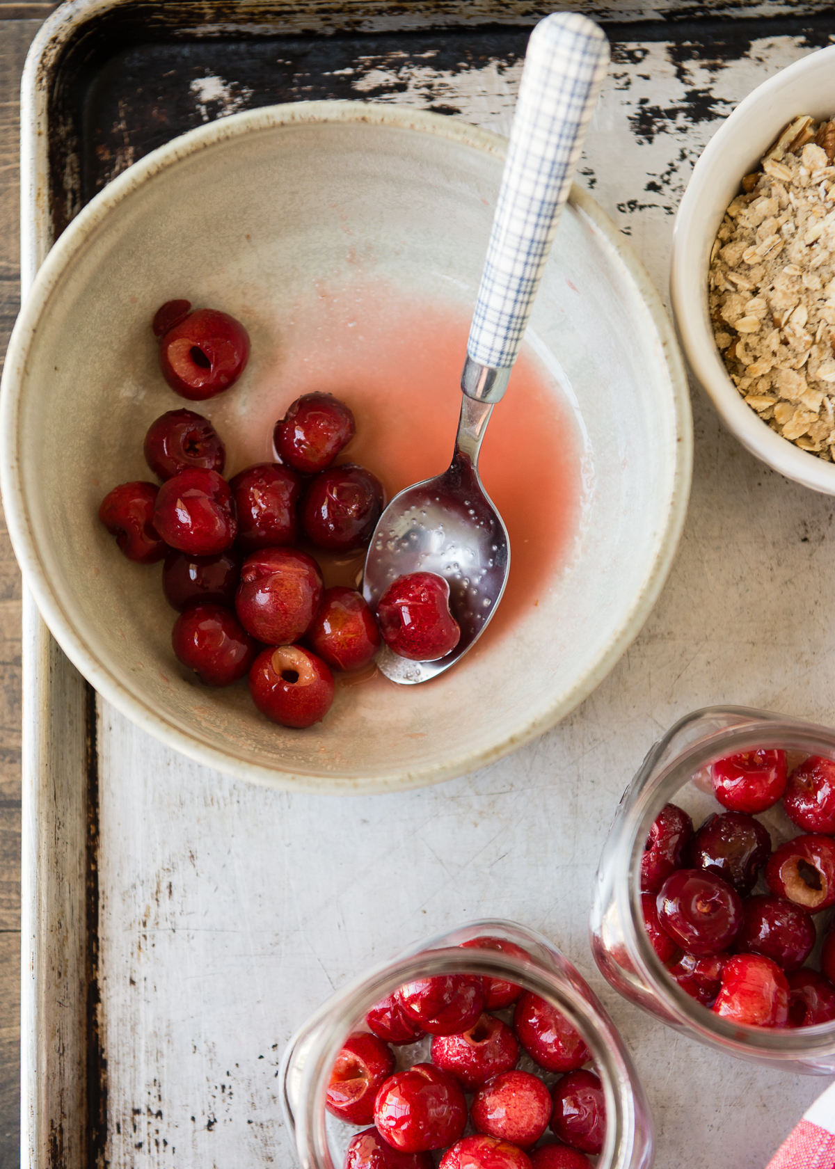 Bowl and spoon with cherries