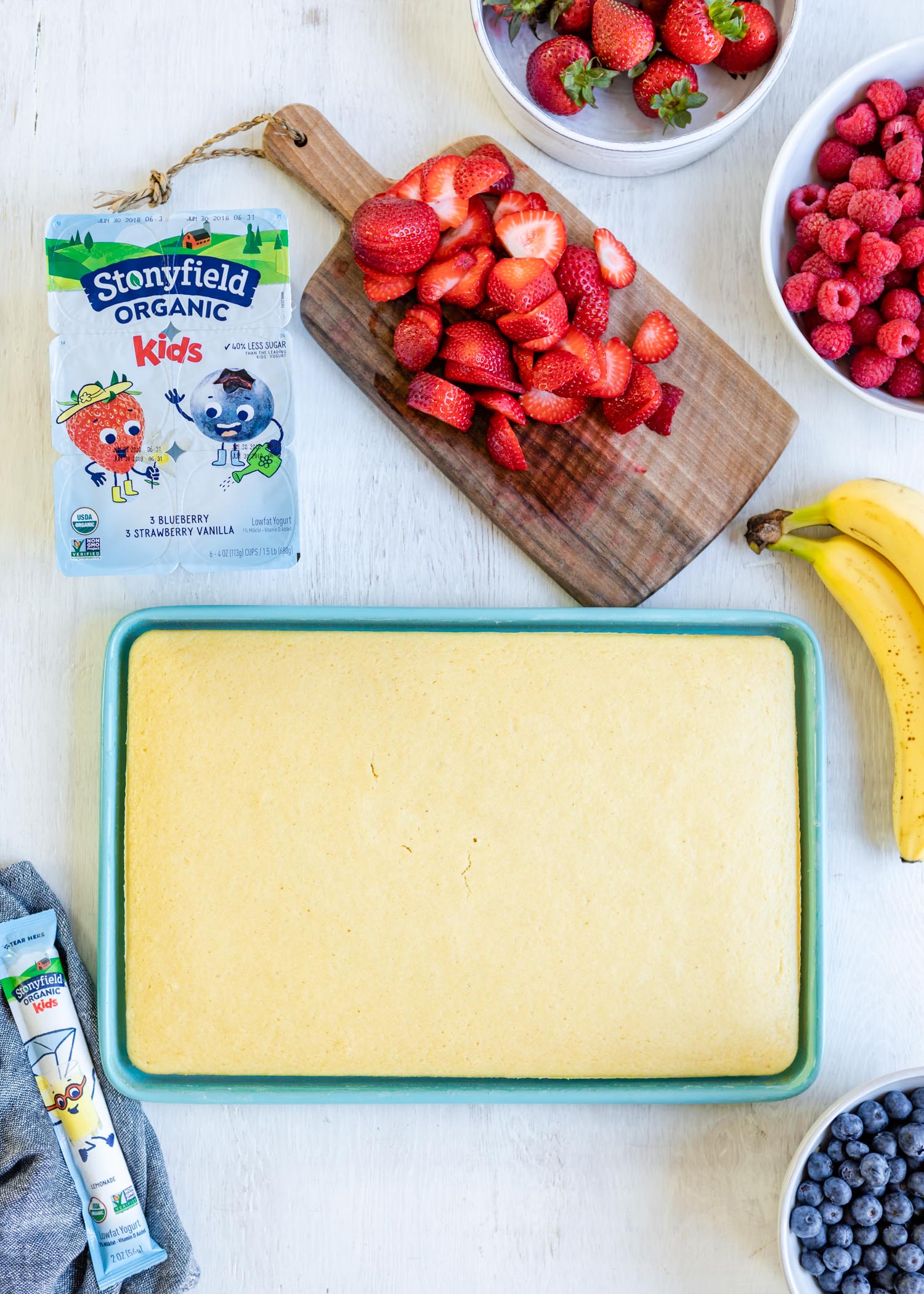 Recipe: Yogurt Lemon Sheet Cake Kids Can Make All By Themselves featured by popular lifestyle blogger Design Mom